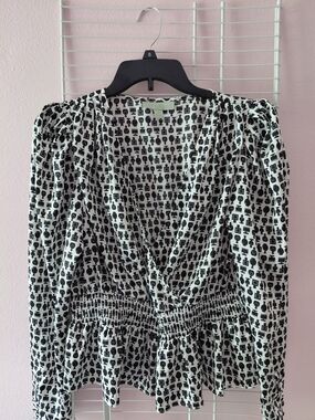 Printed Black and White V-Neck Peplum Dress